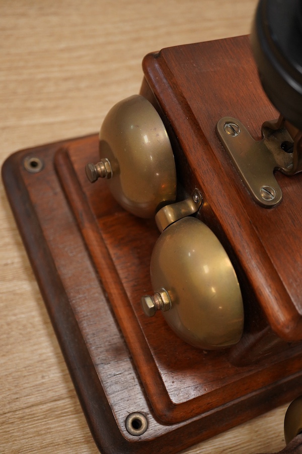 A 1920s walnut wall mounted GPO Model 121 telephone, Patent no.178938. Condition - good.